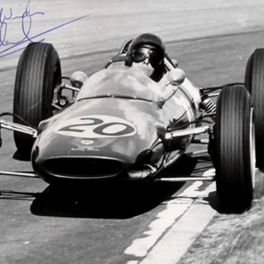 Victoire au GP de Grande Bretagne au volant de la Lotus 24